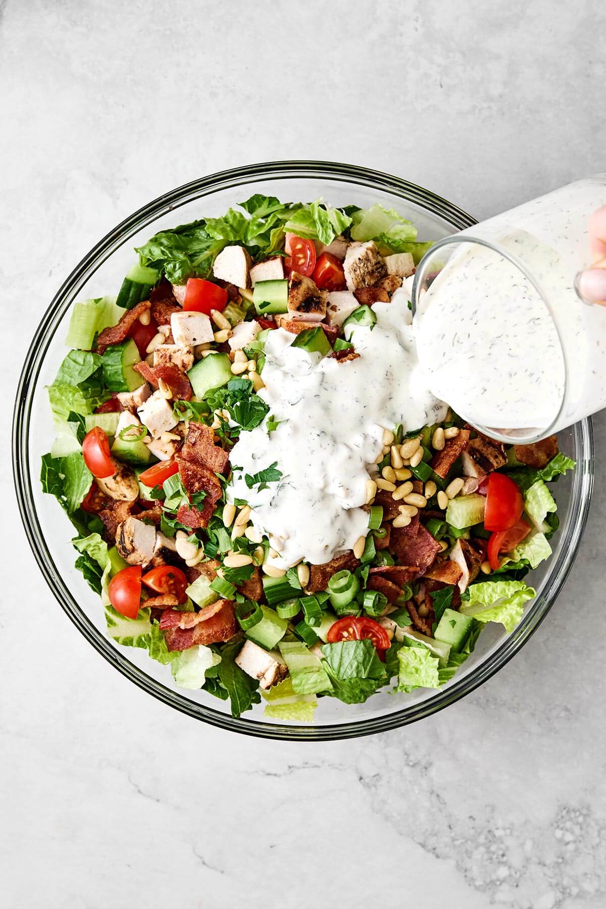 Making grilled chicken salad.