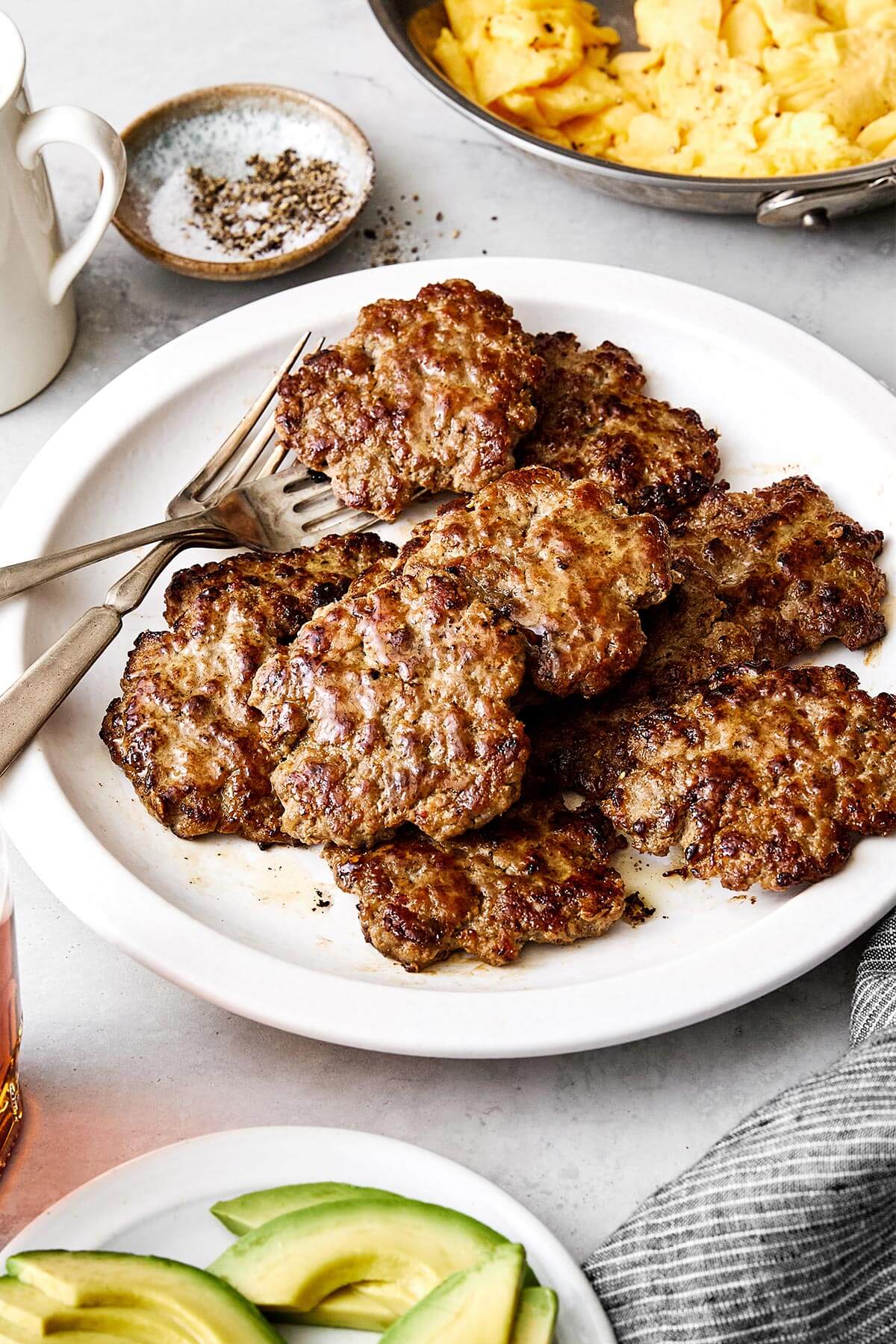 A plate of breakfast sausages.