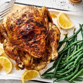 A dish with an air fryer whole chicken.