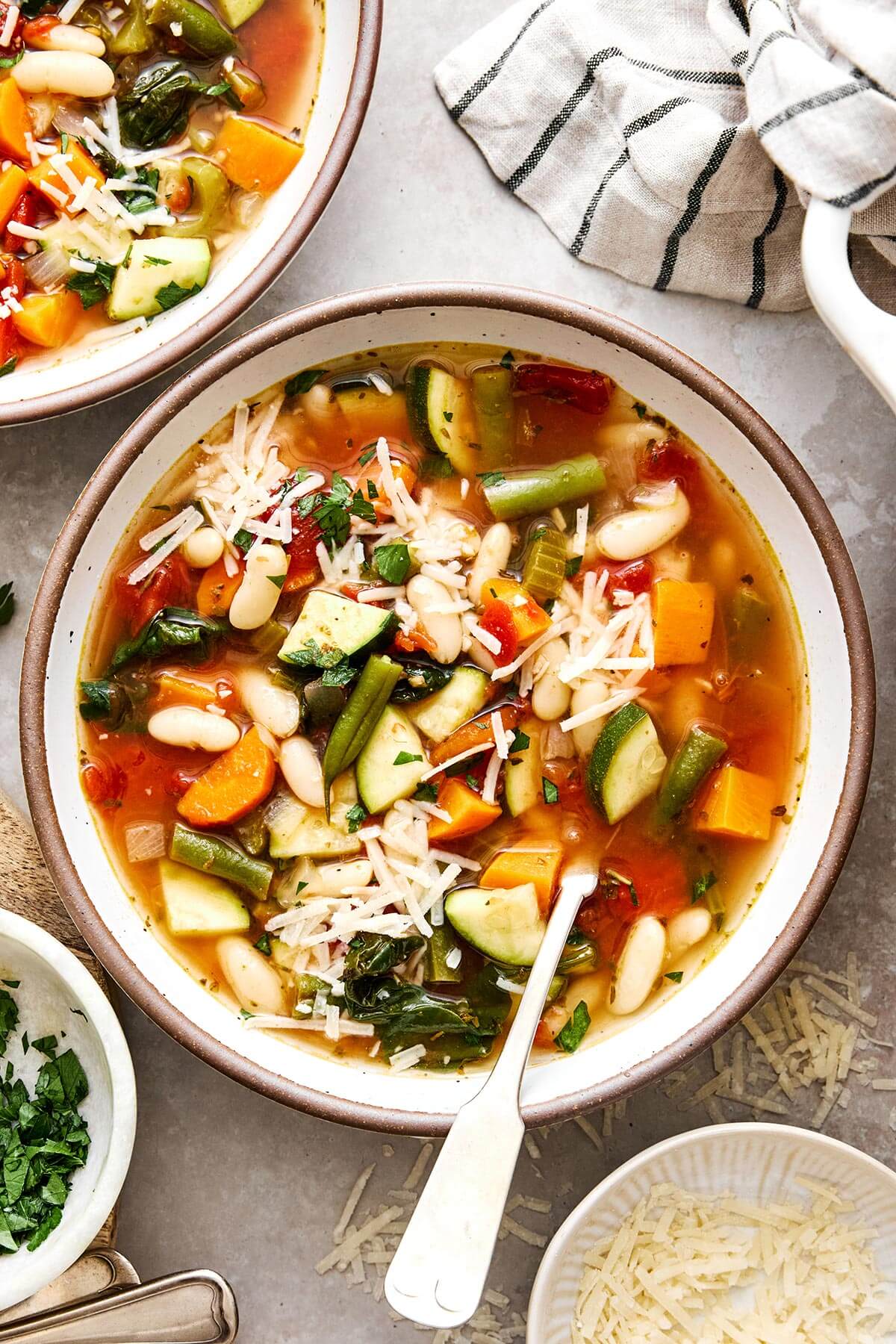 A bowl of minestrone soup.