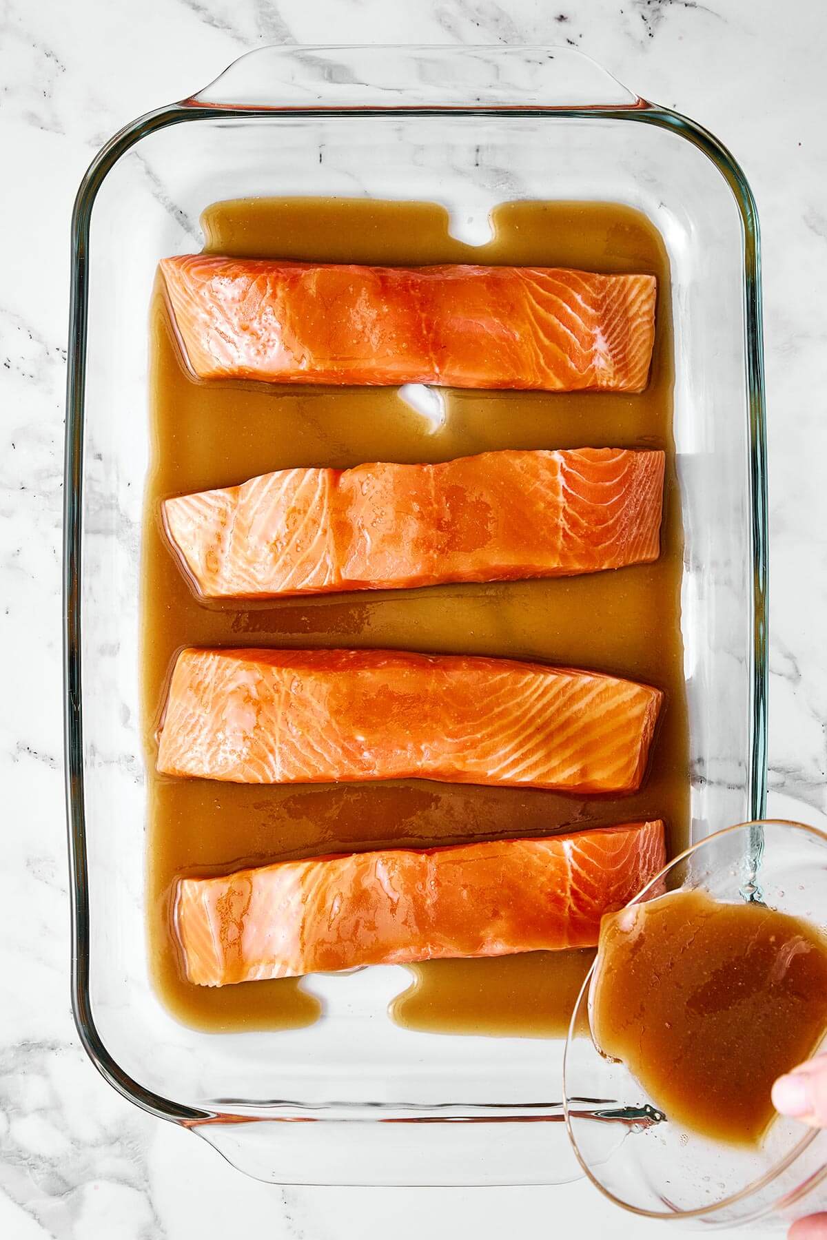 You'll crave this miso salmon time and again! It's incredibly simple, packed with umami flavor, and broiled to perfection in 7 minutes! Marinating miso salmon.