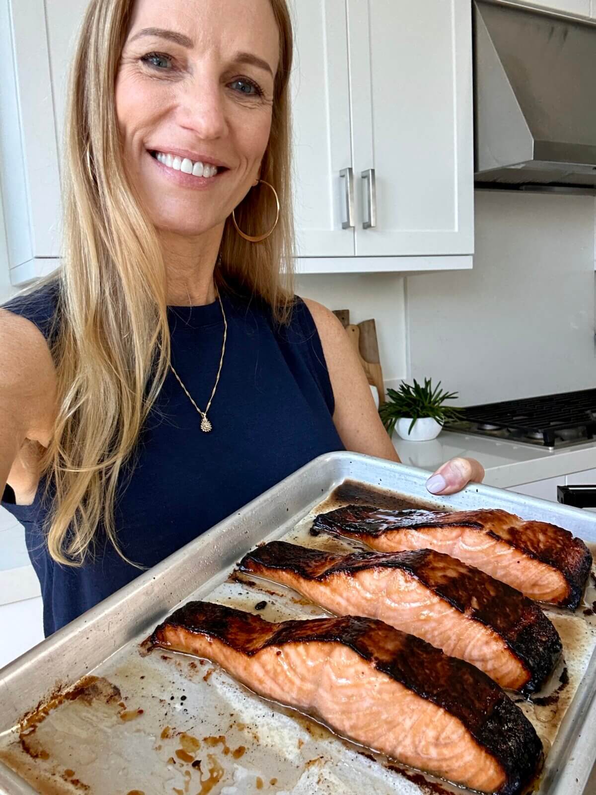 Lisa enjoying miso salmon. Lisa enjoying miso salmon.