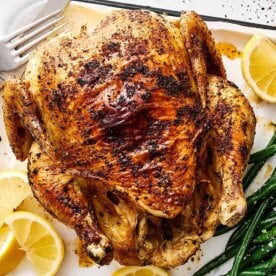 A dish with an air fryer whole chicken.