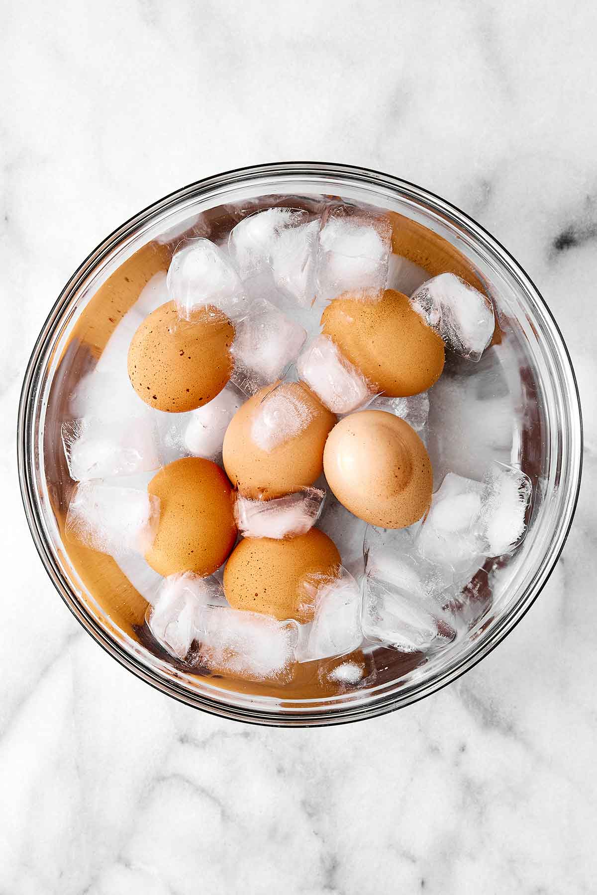 Hard boiled eggs in an ice water bath.