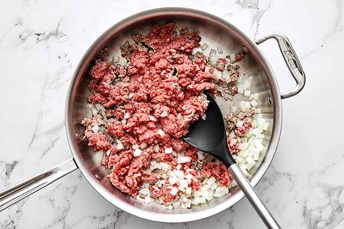 Cooked ground beef.