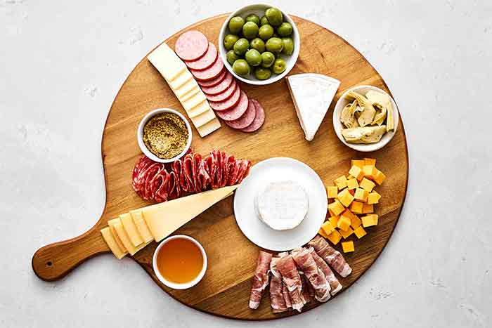 Step three of a charcuterie: Add bowls.