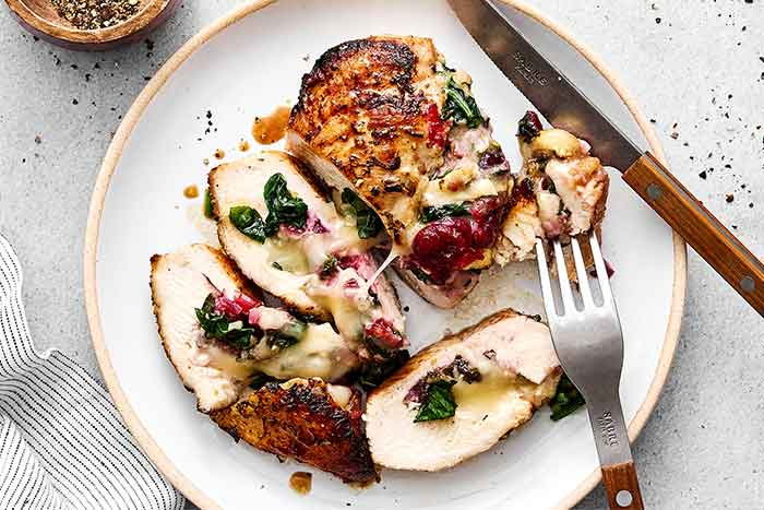 How to make cranberry brie stuffed chicken breasts.