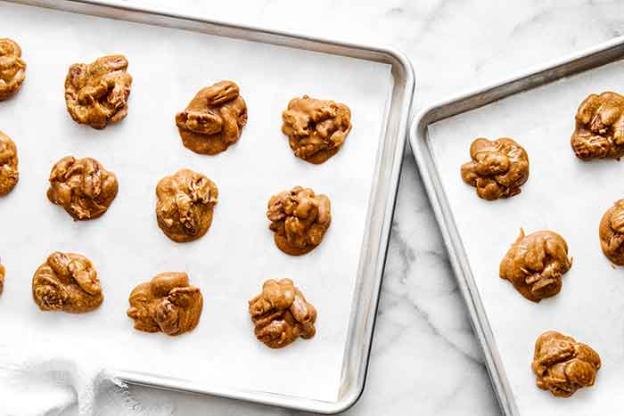 Step six of pecan pralines: Let cool on baking sheet.