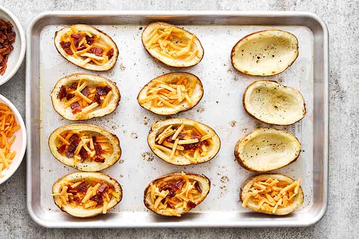 Step four of potato skins: Add the filling.