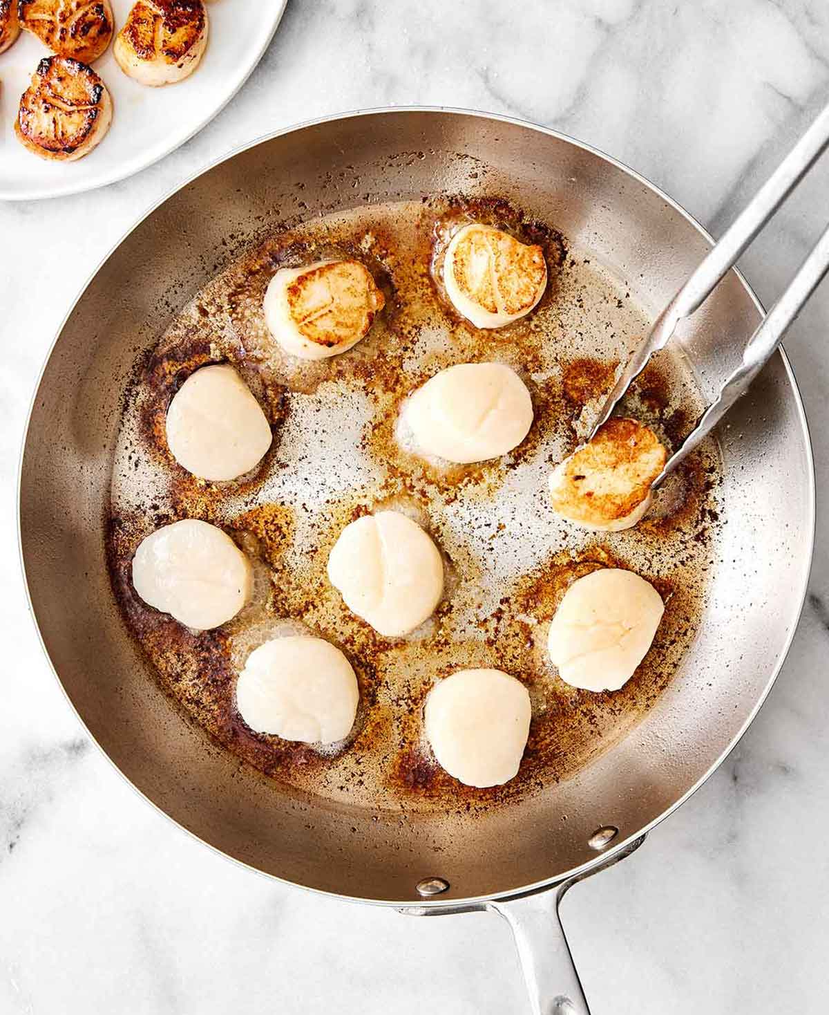 Step two of seared scallops: sear the scallops.