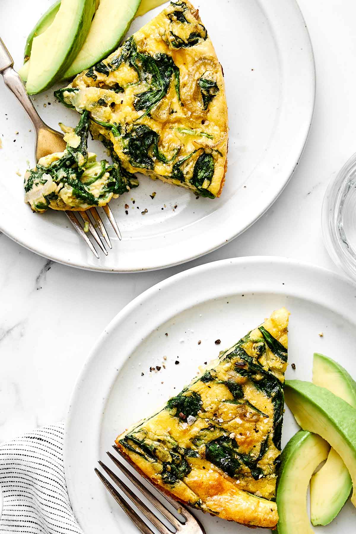 Slices of crustless quiche.