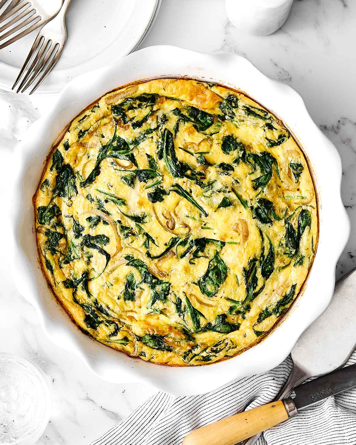 Step five of crustless quiche: bake the quiche.