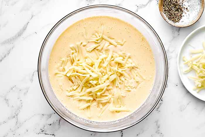 Step three of crustless quiche: make the egg mixture.