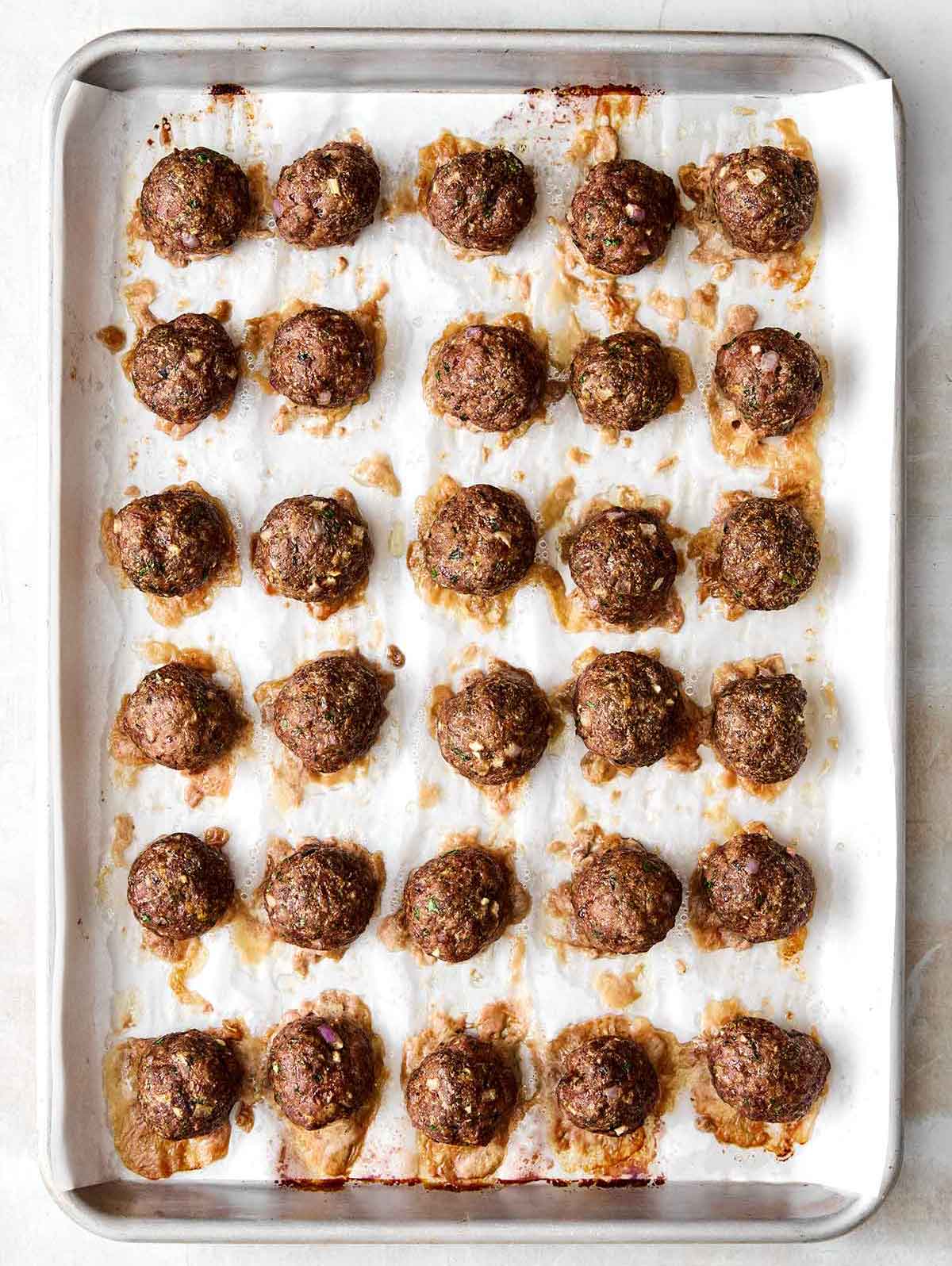 Step three of lamb meatballs: bake in oven.