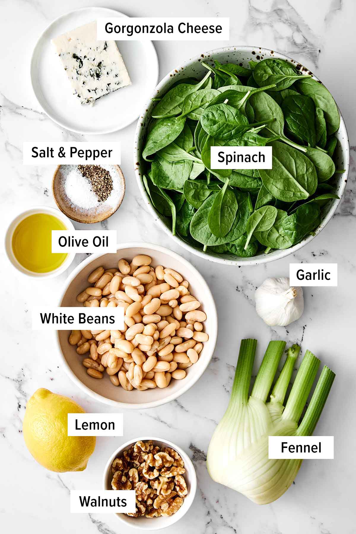 This warm spinach and white bean salad is my nudge to make more warm salads! It’s simple yet savory, healthy, and perfect for colder months. Spinach and white bean salad ingredients.