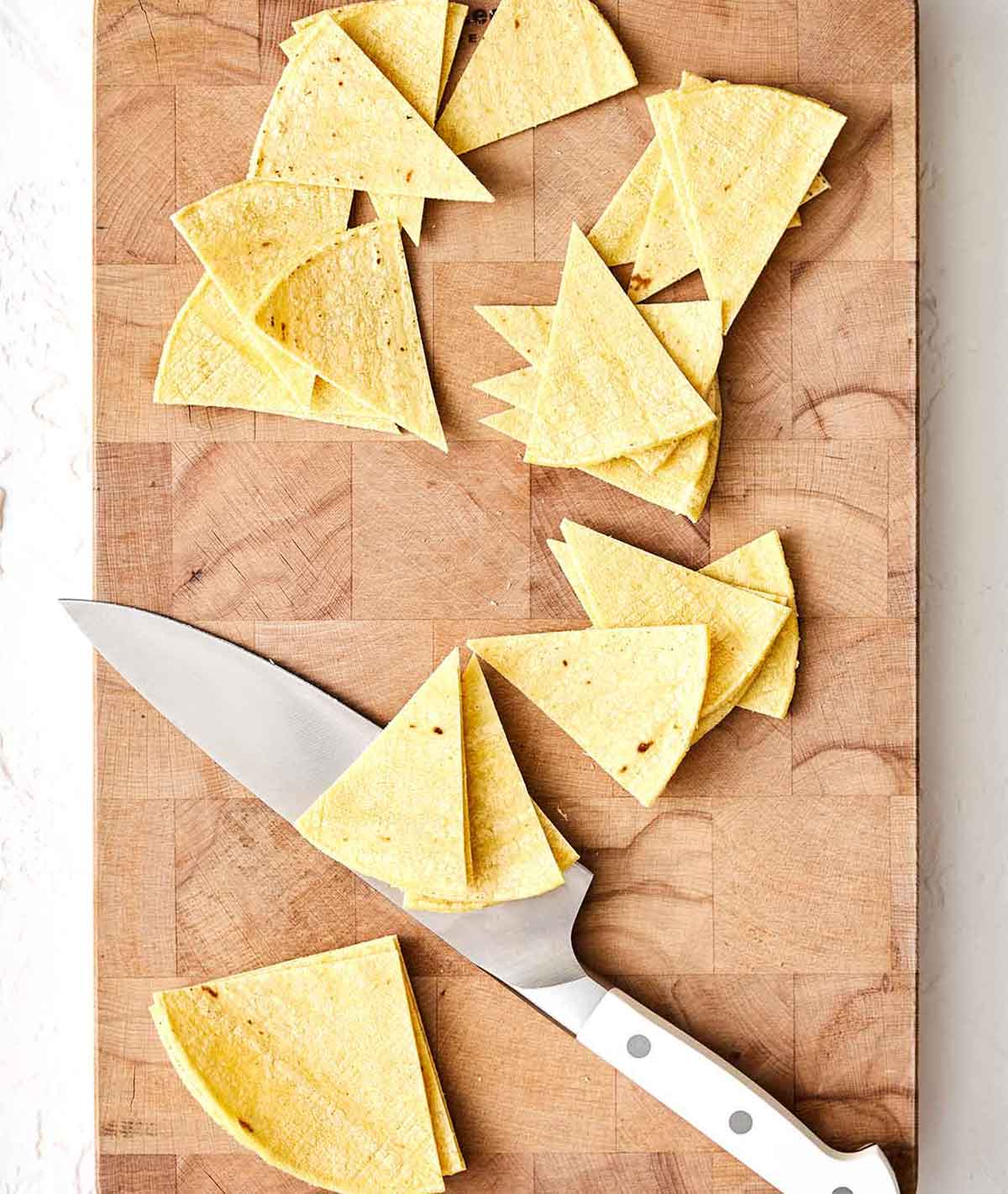 Step one chilaquiles: slice tortillas.