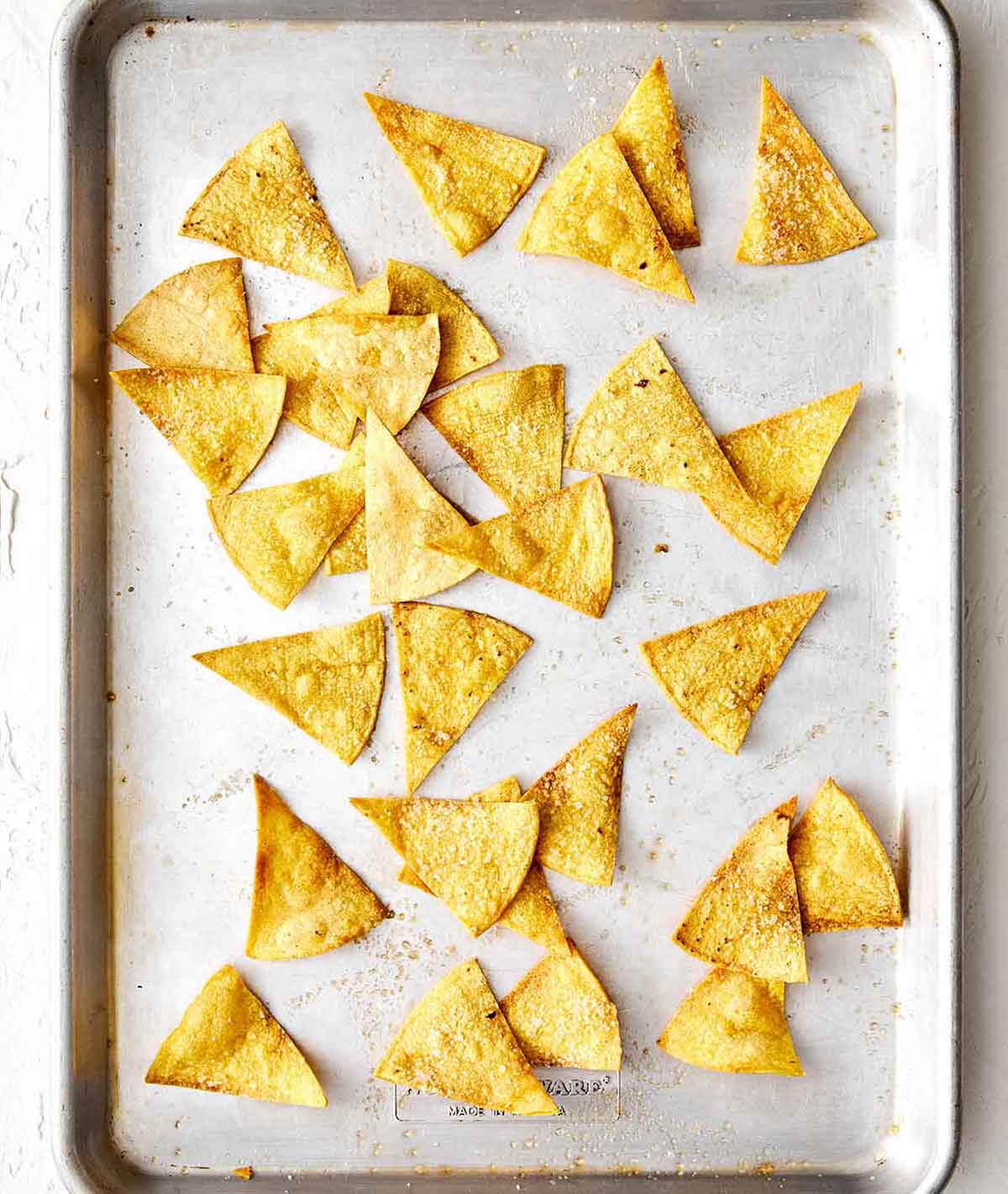 Step two chilaquiles: bake chips.