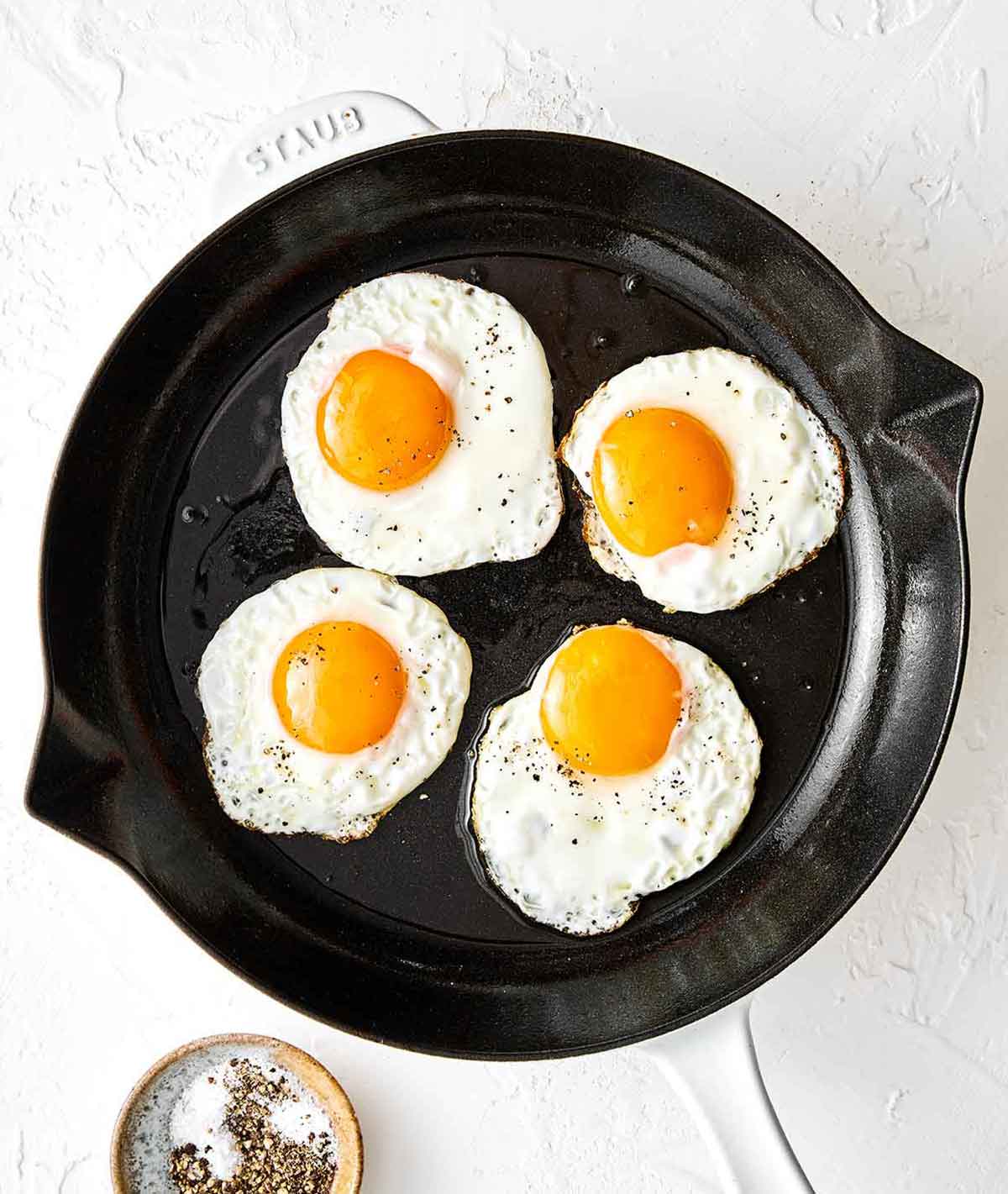 Step four of chilaquiles: fry eggs.