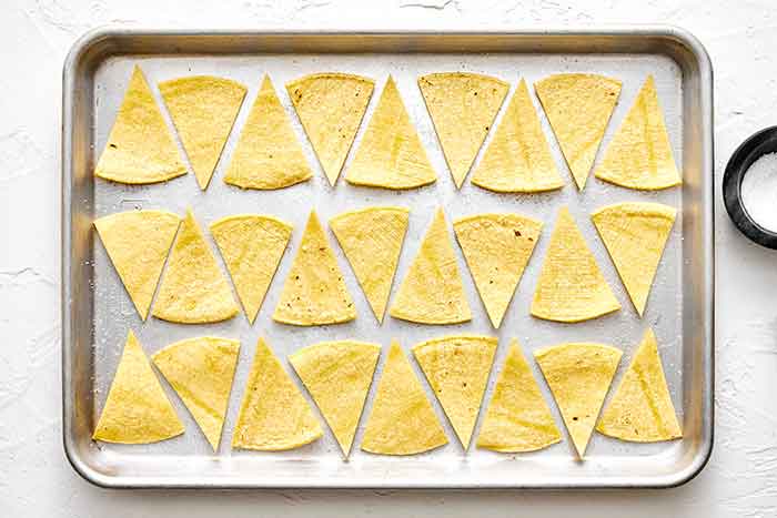 Step two chilaquiles: bake chips.