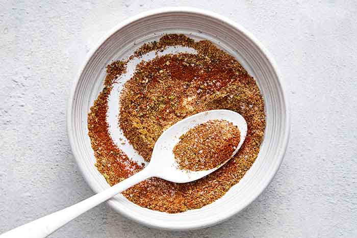 Step one of sheet pan chicken fajitas: make seasoning.