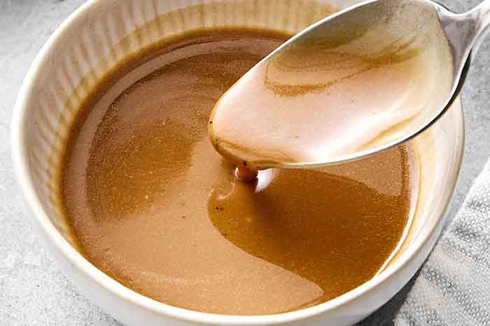 Balsamic vinaigrette in a bowl for strawberry salad.