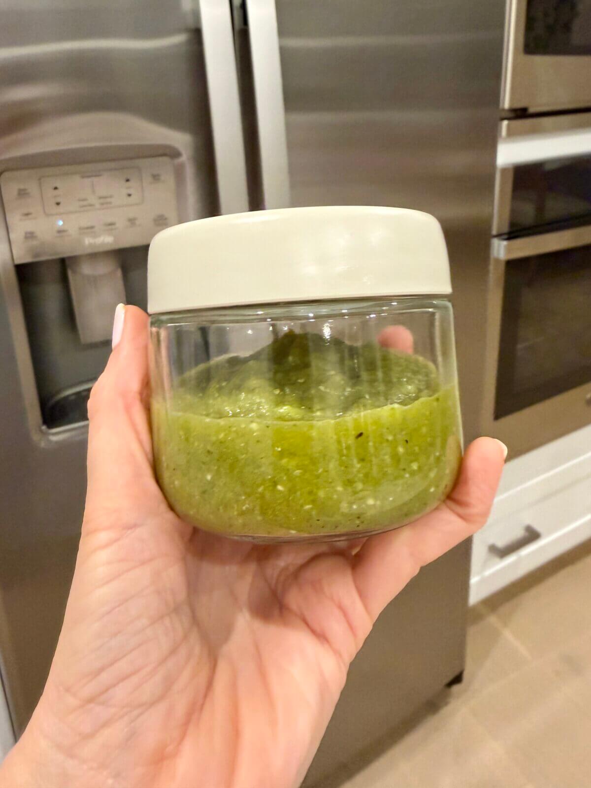 Lisa testing salsa verde recipe.