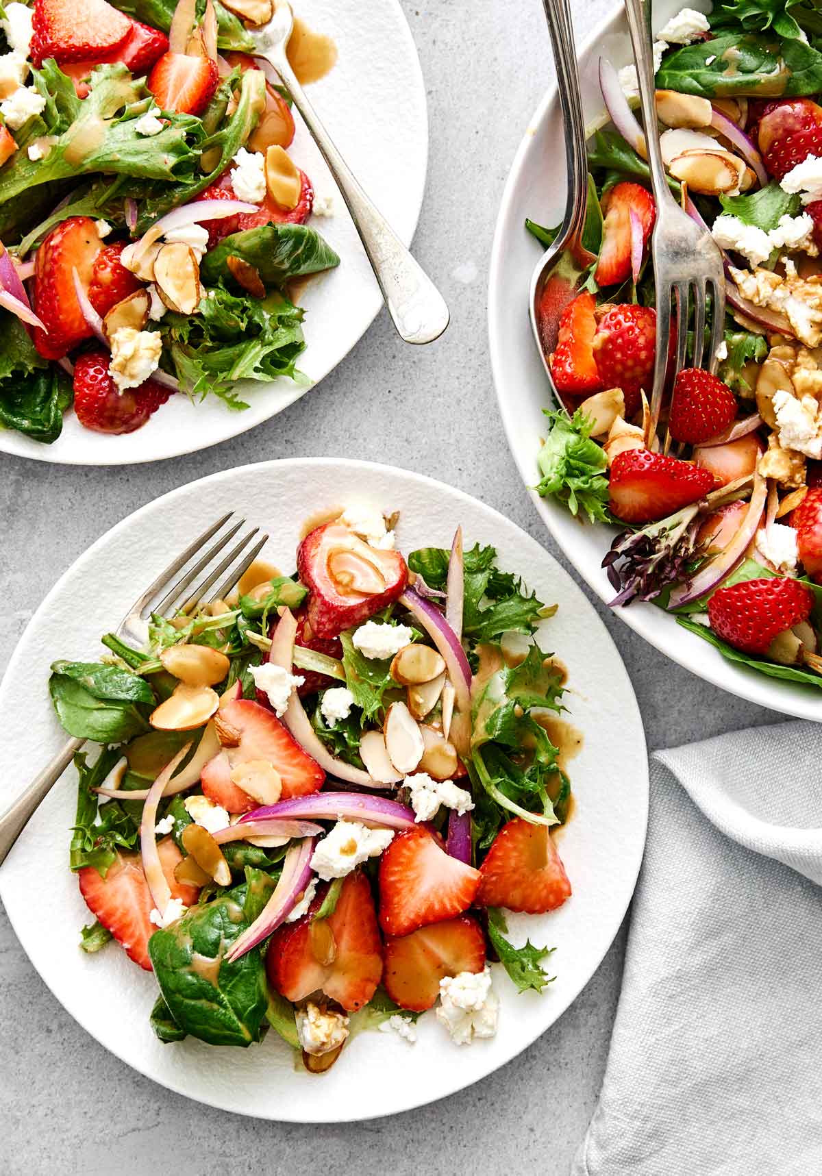 Healthy salad dressings featuring a strawberry salad with balsamic.