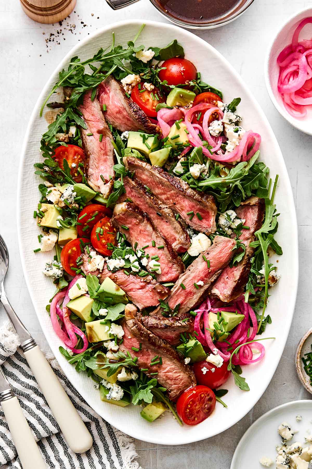 The best summer steak salad on a plate.