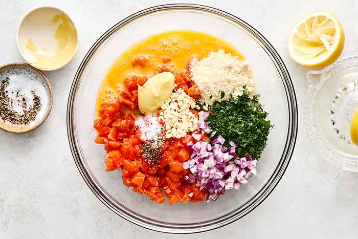 Salmon burger ingredients in a bowl.
