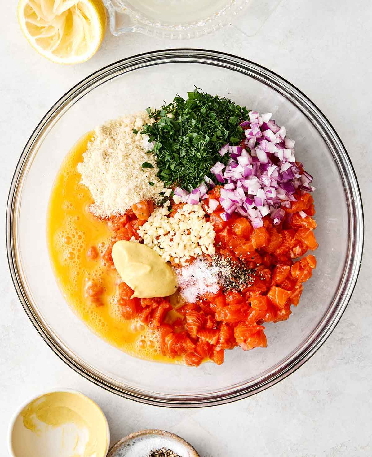 Salmon burger ingredients in a bowl.