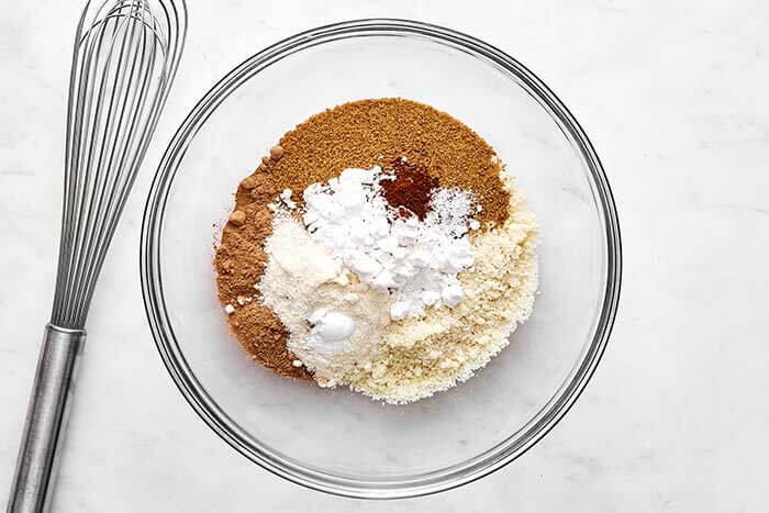 Whisking dry ingredients for a baked Alaska.