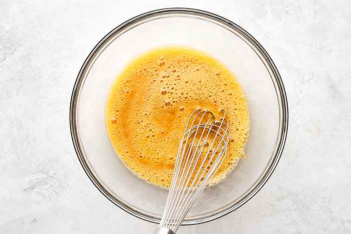 Whisking egg mixture for flan.